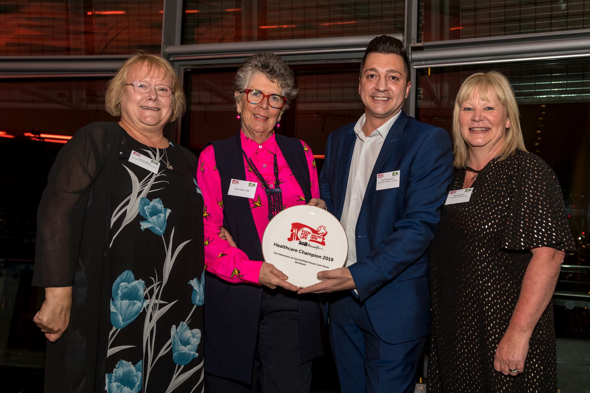 Summerfield House team receiving the award from Prue Leith