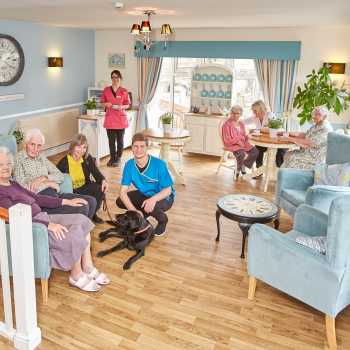 Residents sat comfortably with canine visitor