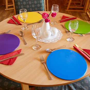 Colourful table place settings at Lashbrook House Care Home
